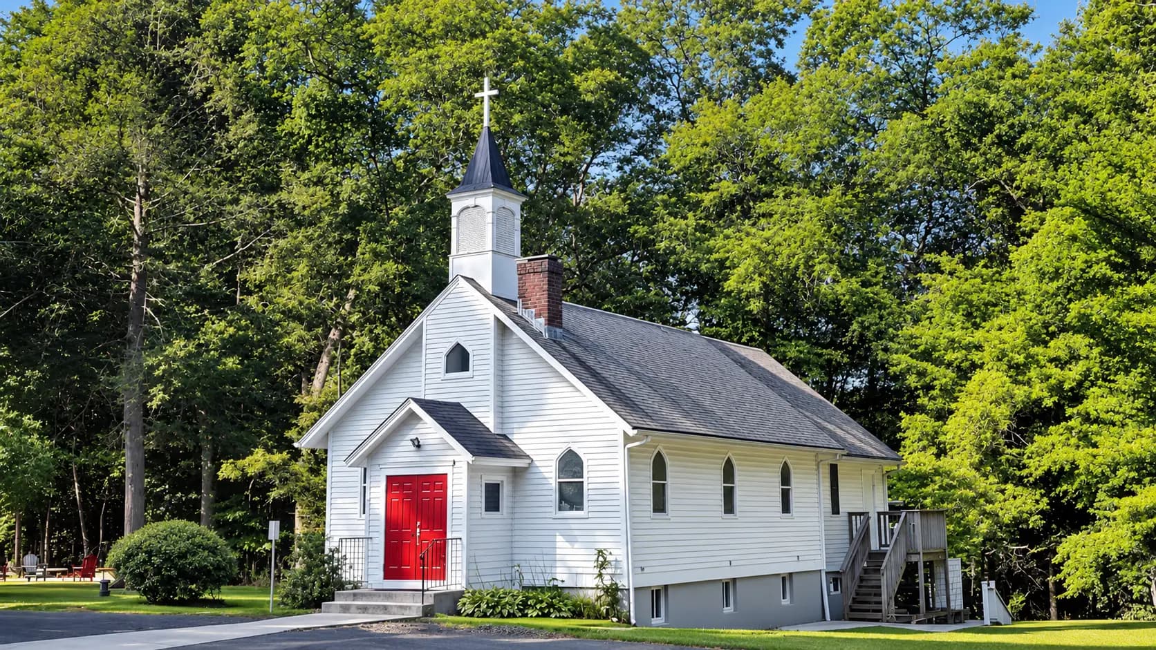 The front of Riverside Community Church with its red double doors